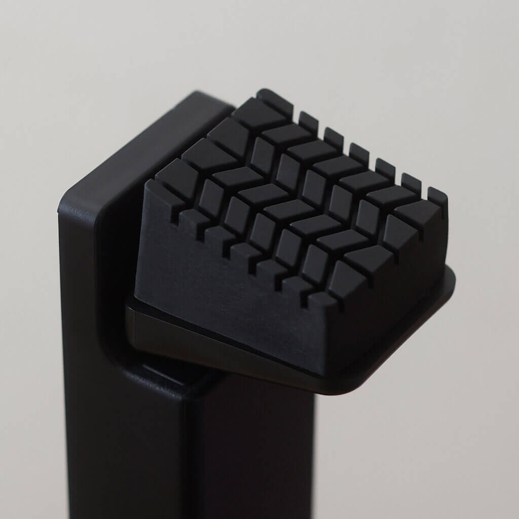 ドアを押すと解除できるドアストッパー