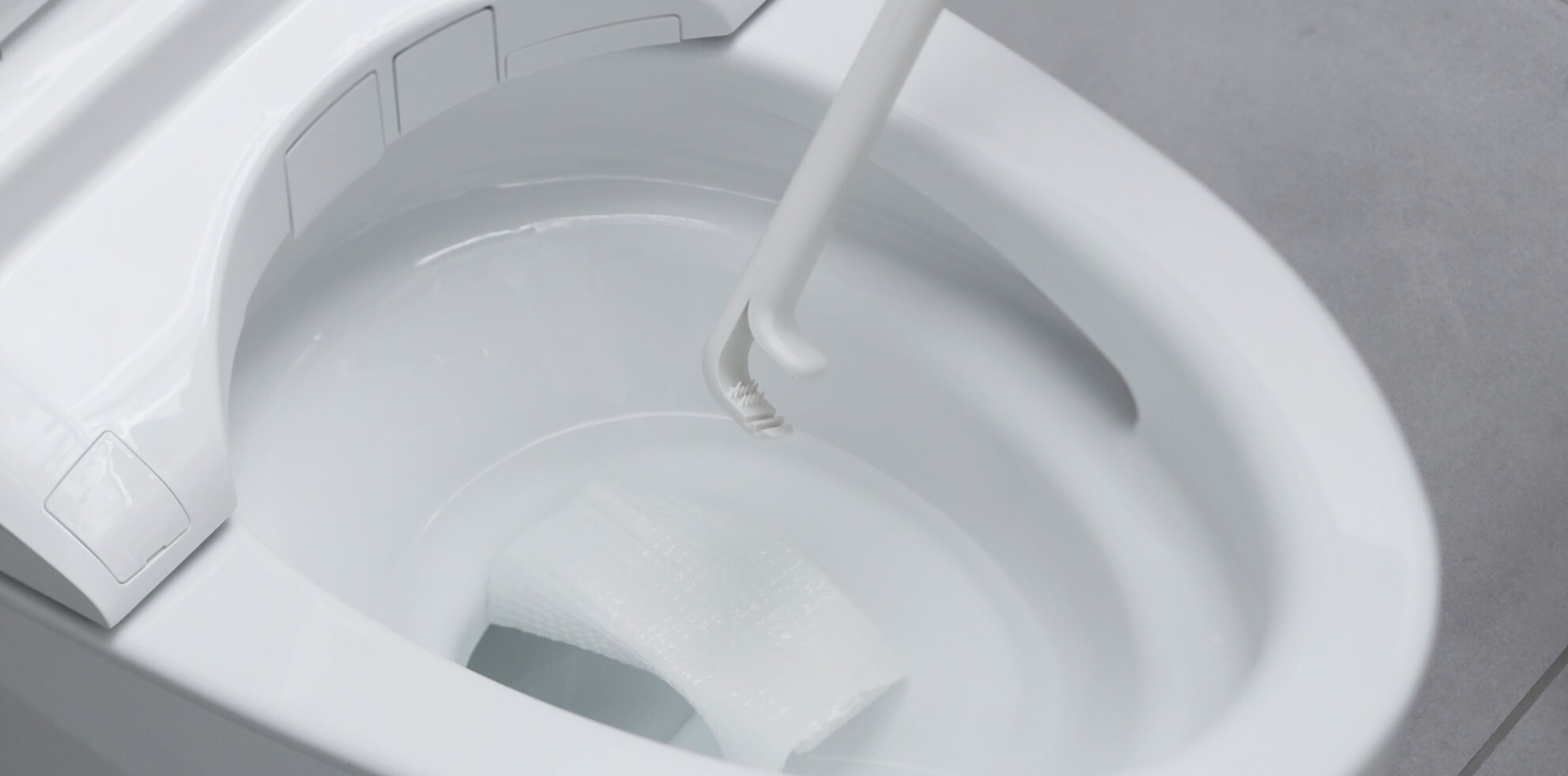 シートを挟むトイレクリーナー