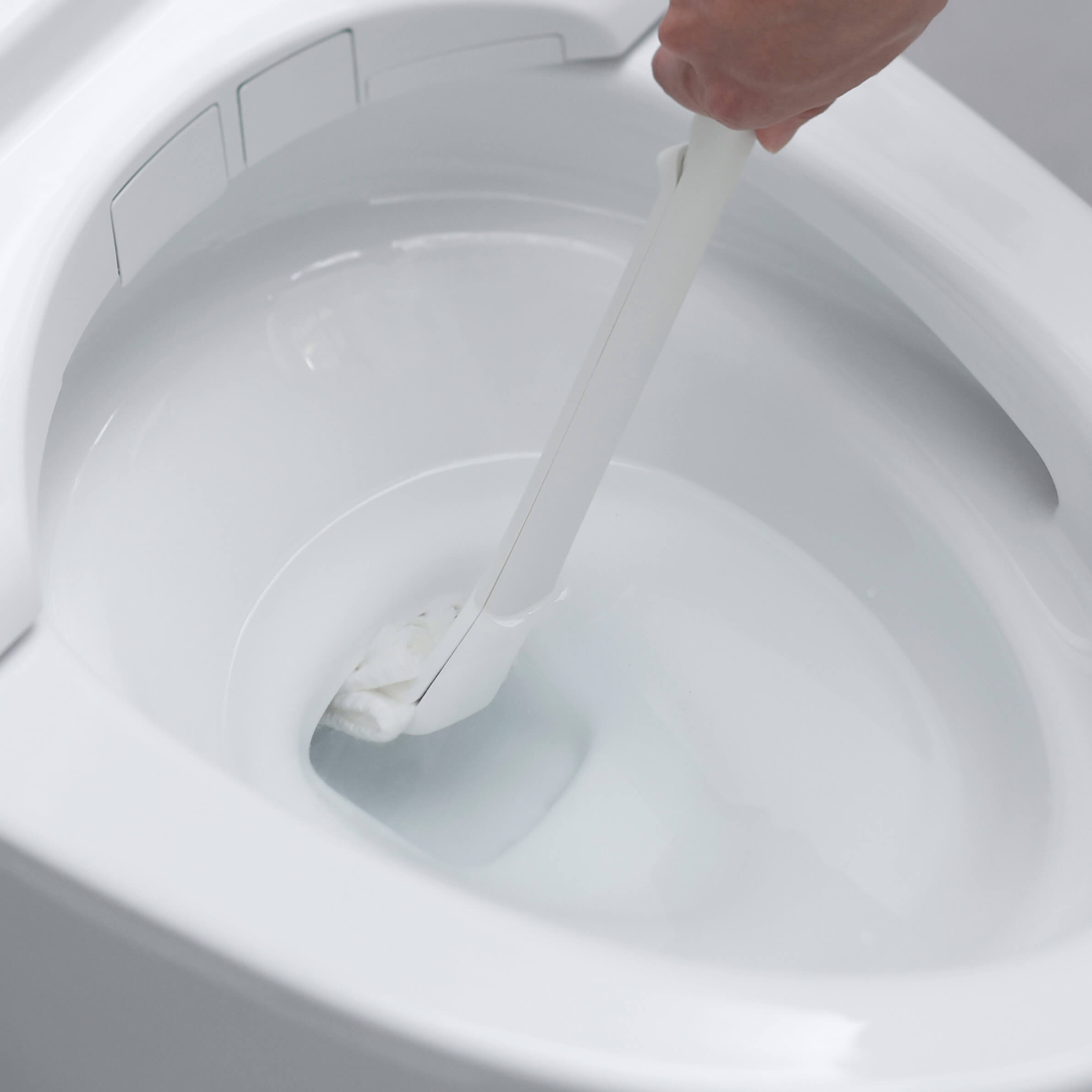 シートを挟むトイレクリーナー